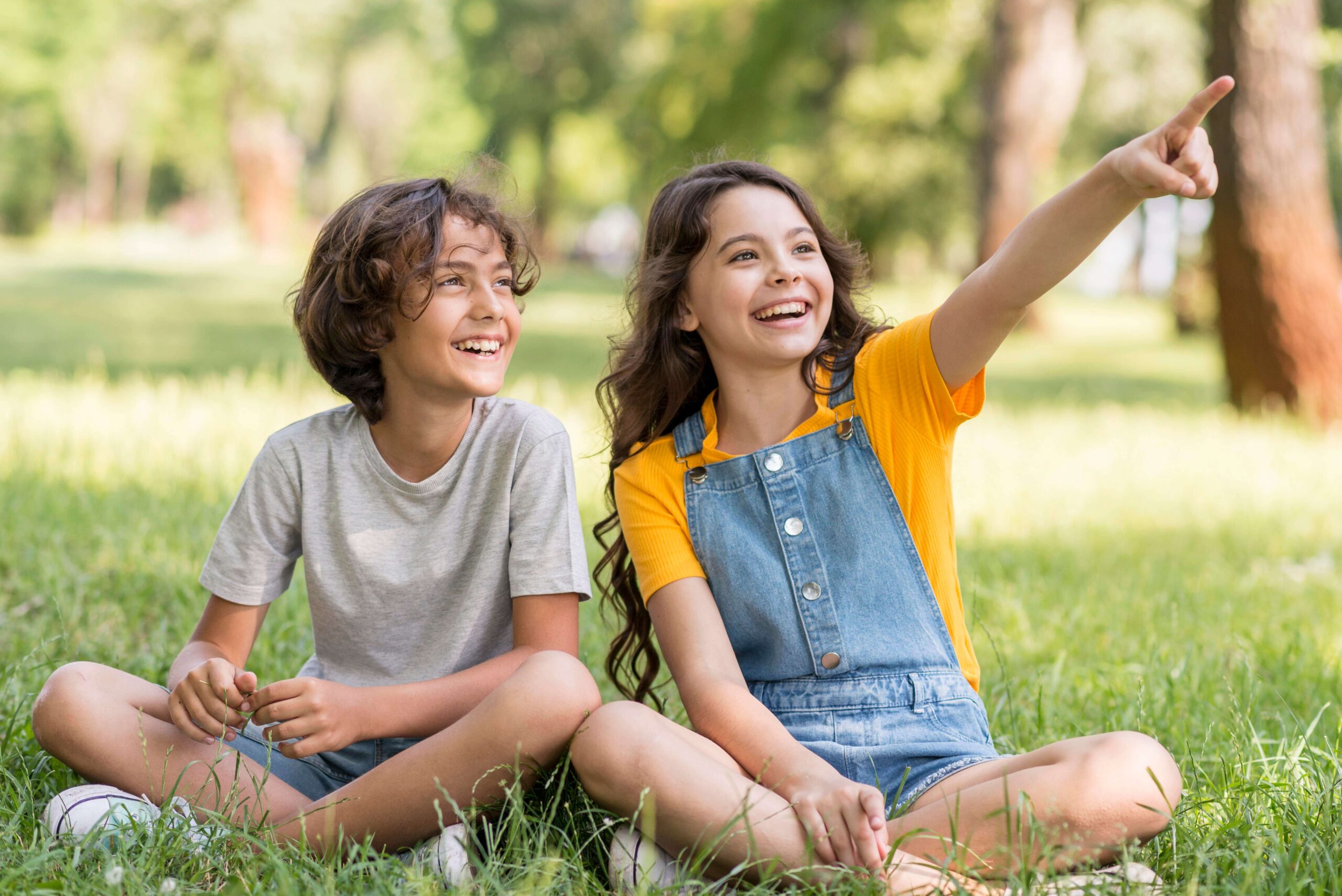 young-friends-outdoor-pointing